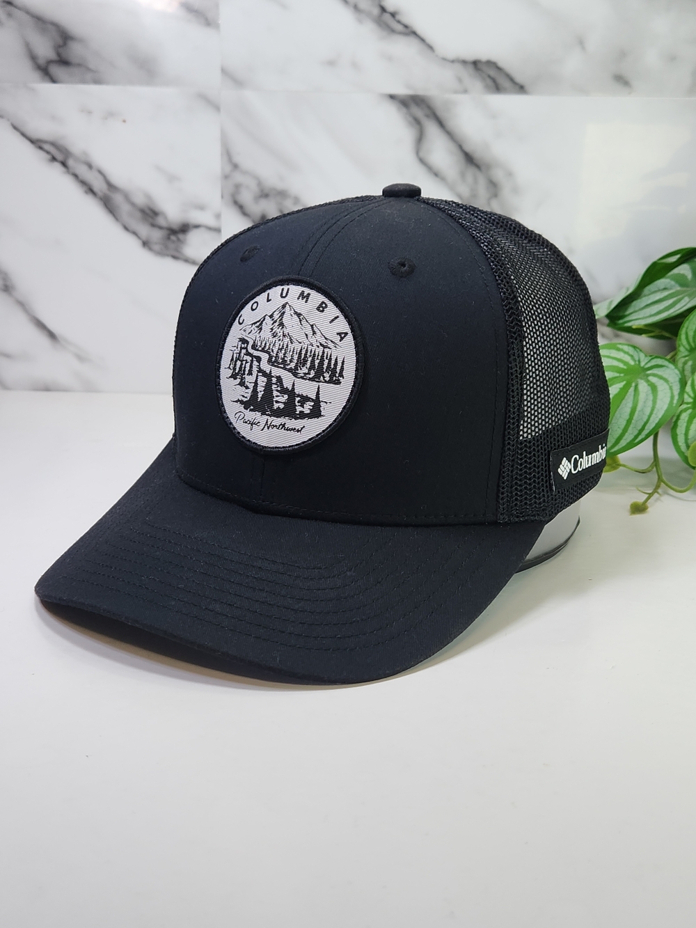 Columbia Black Trucker Hat with Mountain Patch.